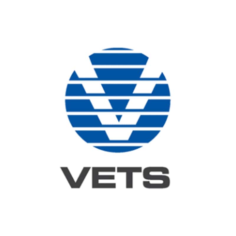 Logo of VETS, featuring a blue circular design with horizontal stripes forming the letter "V" and the text "VETS" in bold gray letters underneath.
